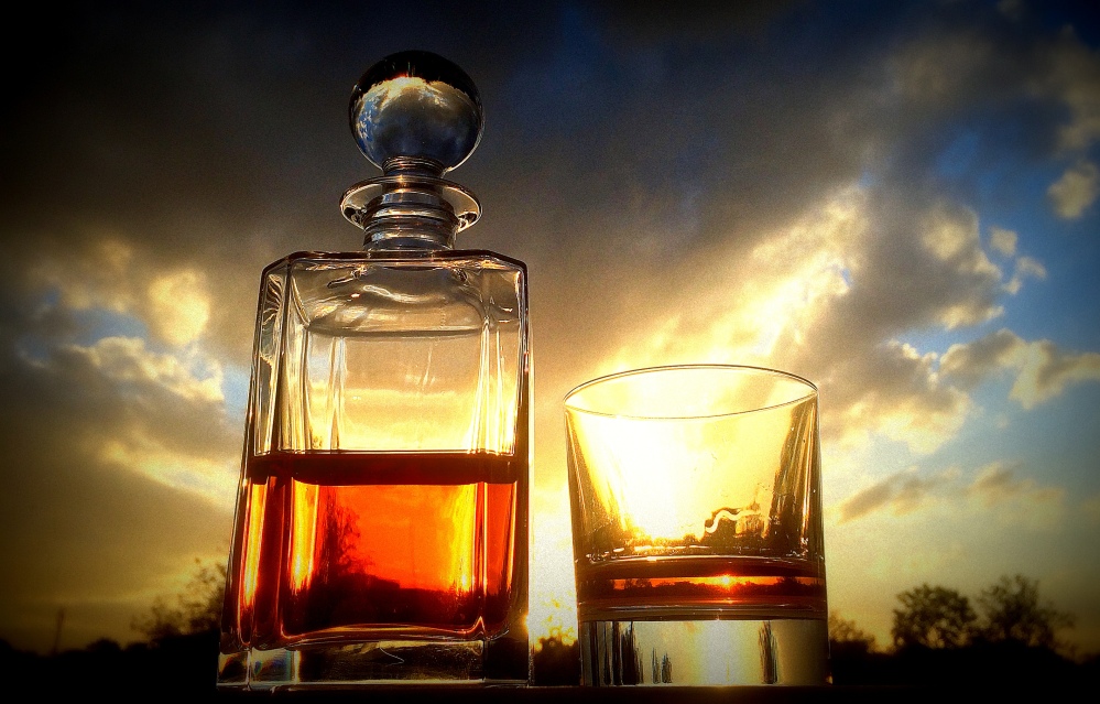 A decanter of whisky at sunset from my ongoing Instagram series titled #sunsetthroughbooze